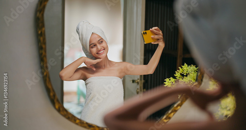 Photography Indian happy gen z young adult female lady wrapped towel head and body after sho