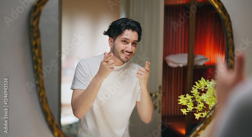 Canvas Print Indian Asian gen z young adult single happy man male guy smiling look mirror tou