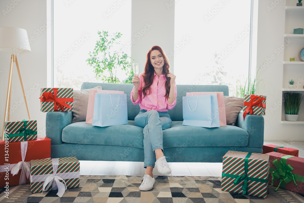Full length photo of lovely young ginger girl sit couch celebrate giftbox birthday dressed pink garment spacious house indoors room Full length photo of lovely young ginger girl sit couch celebrate giftbox birthday dressed pink garment spacious house indoors room