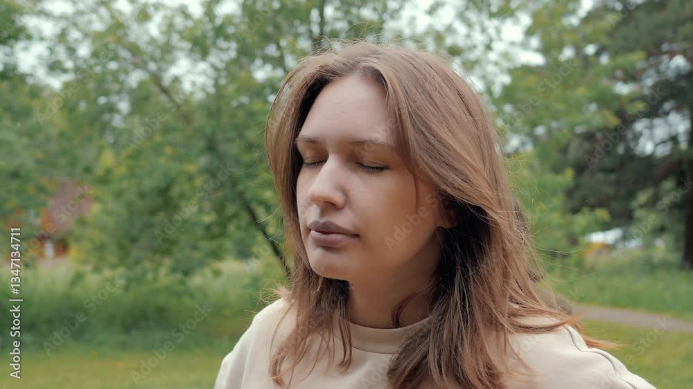 Woman ignoring friend in park setting, multiple takes Woman ignoring friend in park setting, multiple takes