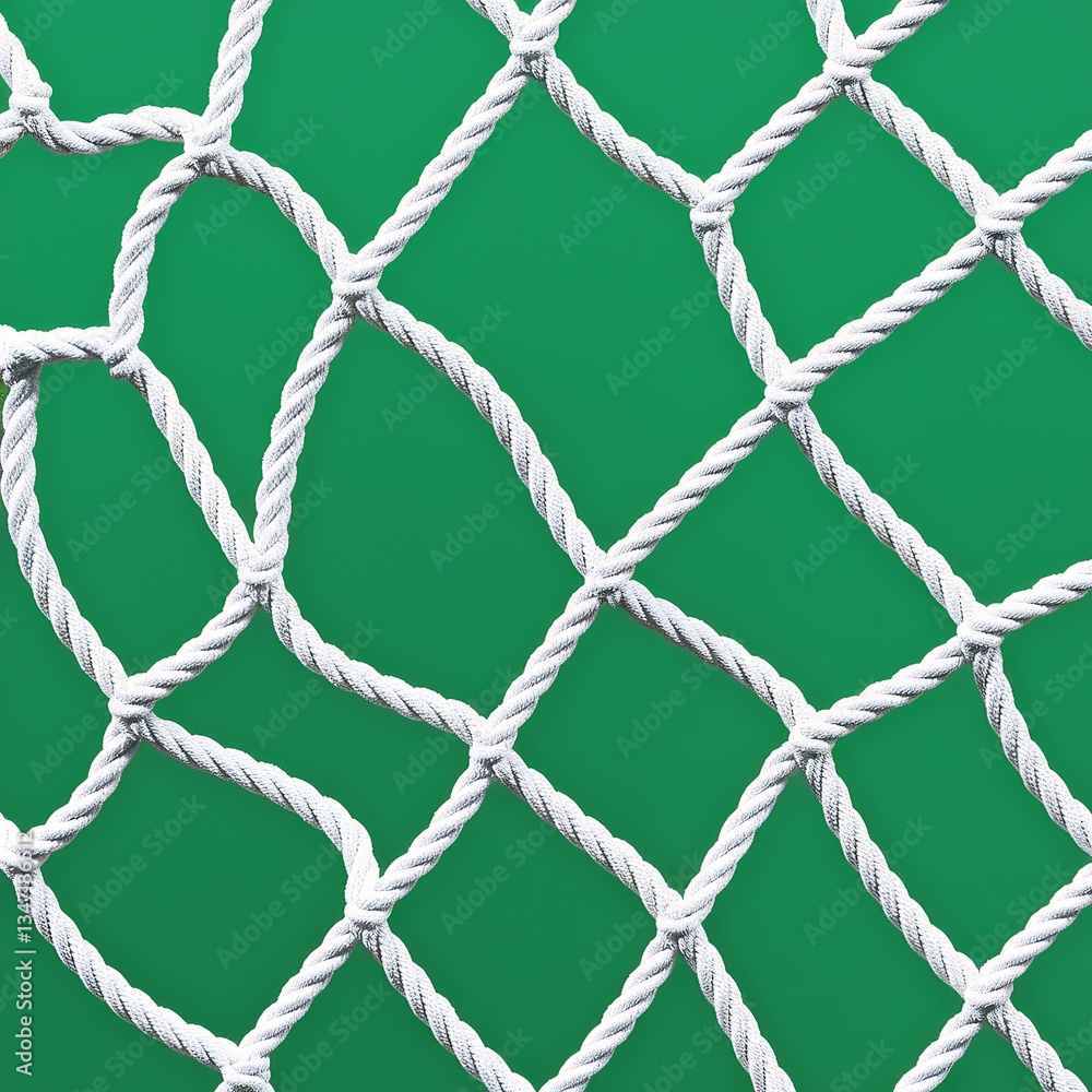 Intricate White Netting Against Lush Green Background Intricate White Netting Against Lush Green Background