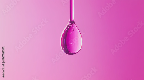 Droplet Suspended in Pink Dreamy Background