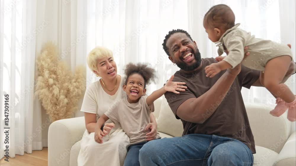 Parents and children relax during their holiday at home Parents and children relax during their holiday at home