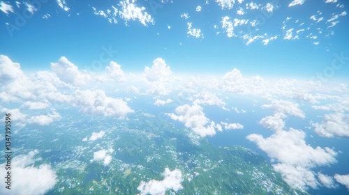 Aerial view of a landscape with puffy white clouds and a clear blue sky. Lush green terrain is visible below, with a hazy, distant perspective