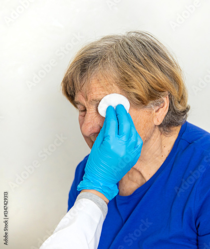 Elderly woman at a doctor appointment. Selective focus.