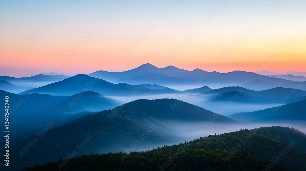 Obraz premium Panoramic Mountain Landscape At Sunset With Blue Haze And Colorful Sky Over Forest Silhouette