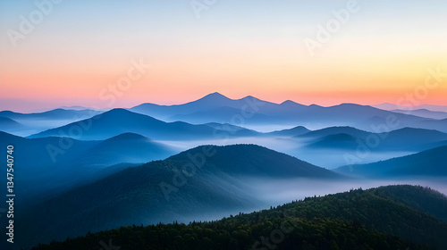 Panoramic Mountain Landscape At Sunset With Blue Haze And Colorful Sky Over Forest Silhouette