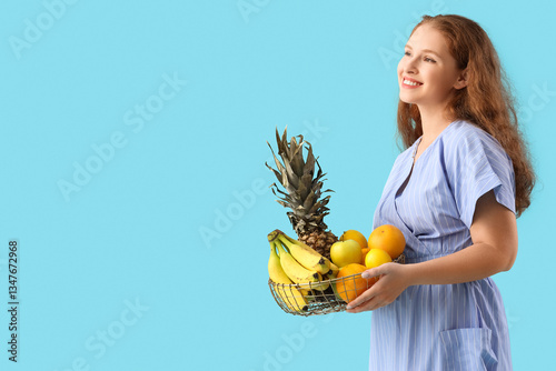 Young woman with basket of ...