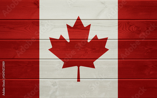 Flag of Canada on an old wooden surface.