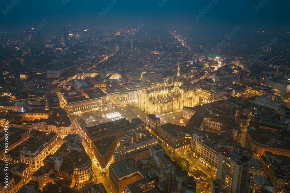 Obraz premium Night aerial drone view of illuminated Milano Duomo, Italy, lights