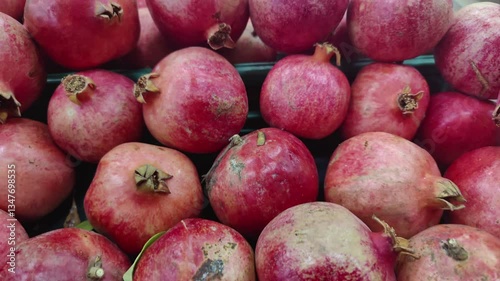 New Season Crop Fresh Red Pomegranate Heaps on Market Counter Footage.