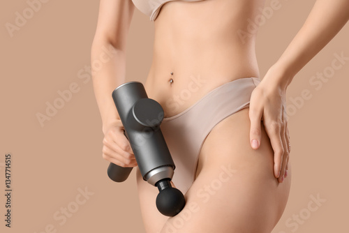 Young woman in underwear ma...