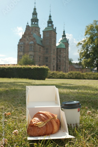 Photography Croissant and coffee in a park in Copenhagen