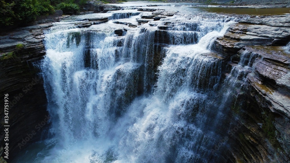 Fototapeta premium Bridge over Multi-layer Huge Waterfall at Letchworth State Park in Upstate New York