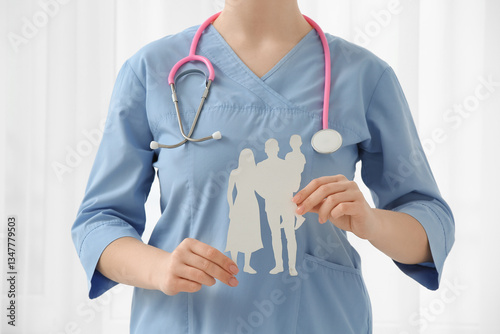 Female doctor with family f...