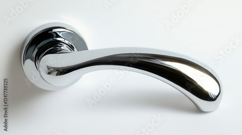 Sleek Chrome Door Handle with Curved Design Mounted on a Circular Base Plate