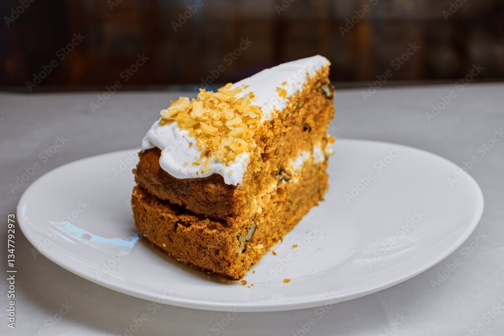 Rustic Carrot Cake Slice with Cream Cheese Frosting and Walnuts Rustic Carrot Cake Slice with Cream Cheese Frosting and Walnuts