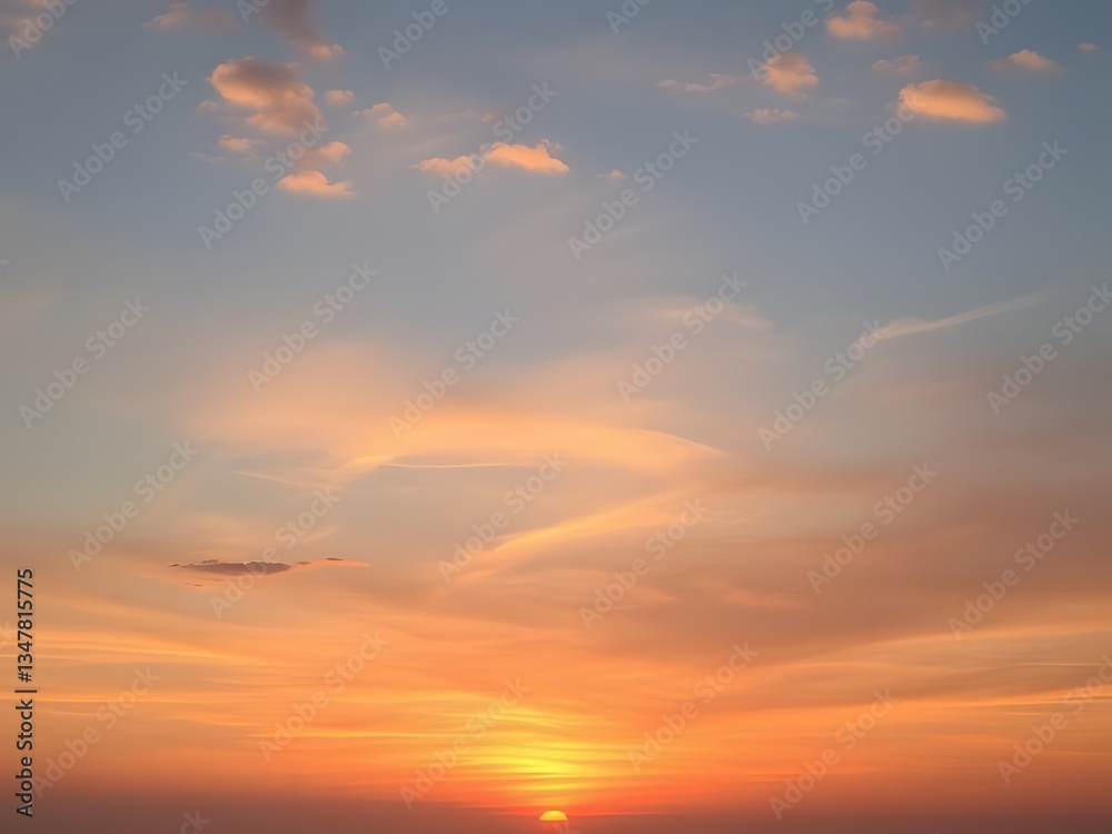 Fototapeta premium Vibrant Sunset Sky with Clouds Orange, Yellow, and Blue Hues, Nature Photography, Beautiful Horizon, Scenic Background