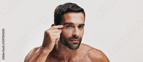 Check, wrinkles or portrait of man in studio for skincare glow, face beauty or dermatology. Antiaging cosmetics, mockup space or model on white background for facial treatment, banner or inspection