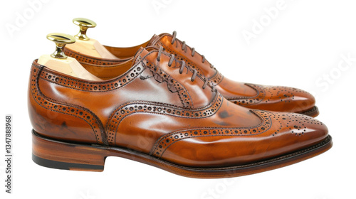 Classic polished brogue oxford shoes with shoetrees on transparent background