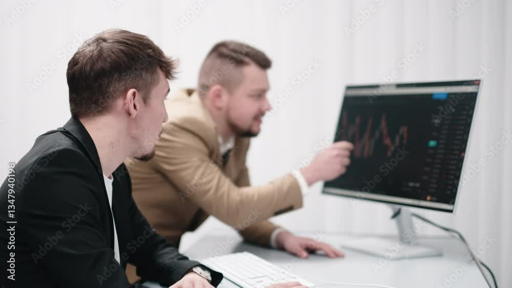 Two traders discussing cryptocurrency charts on a computer, analyzing financial risks and forecasting investment profits. Concept market research, investments, and making informed decisions. Two traders discussing cryptocurrency charts on a computer, analyzing financial risks and forecasting investment profits. Concept market research, investments, and making informed decisions.