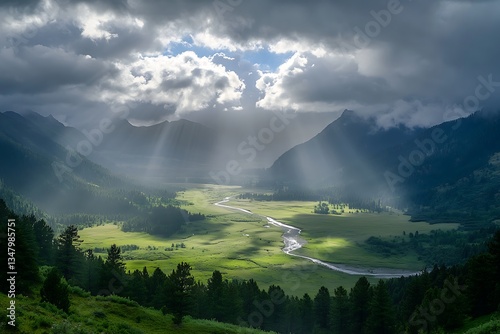 Sunlight Breaking Through Thick Clouds Over a Sprawling Landscape photo