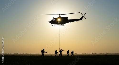 Silhouette of soldiers exiting helicopter - tactical deployment - military training exercises