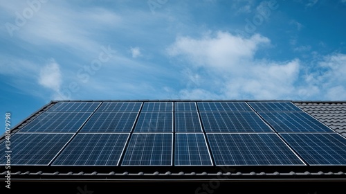 Wallpaper Mural Sustainable Energy: Solar Panels on a Roof Against a Blue Sky Torontodigital.ca