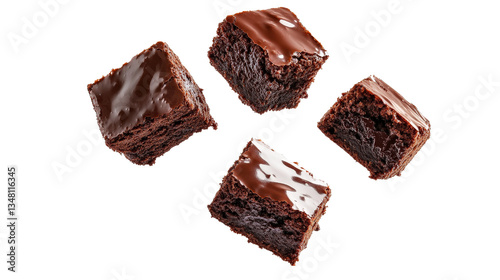 Delicious brownie pieces suspended in mid-air, showcasing their moist texture and glossy chocolate glaze, isolated on a white background