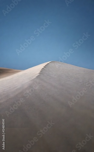 Serene Desert Dunes Against Blue Sky