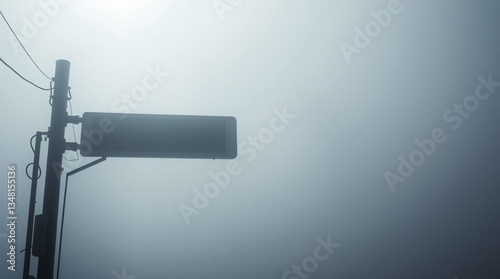 Traffic lights that turn off in dense fog environments