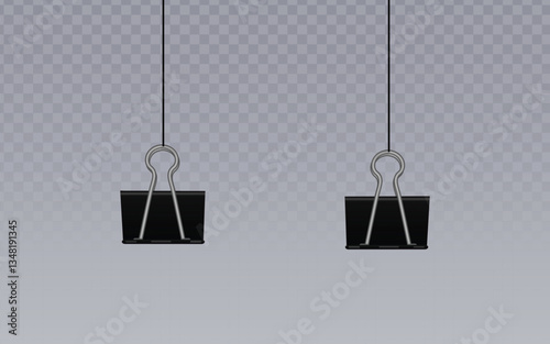 Two identical clips, suspended as if caught mid-air, dominate the composition. Each, a dark form against a subdued background, dangles by a thin, near-invisible line. 