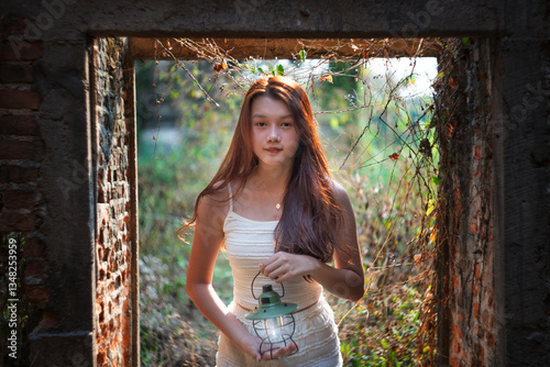 Obraz na płótnie Relax concepts, Beautiful teenage girl on a bright day in nature flowers garden w salonie