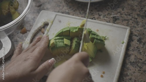 girl cutting avocados in the kitchen, c-log 8bit hd video, canon eos r