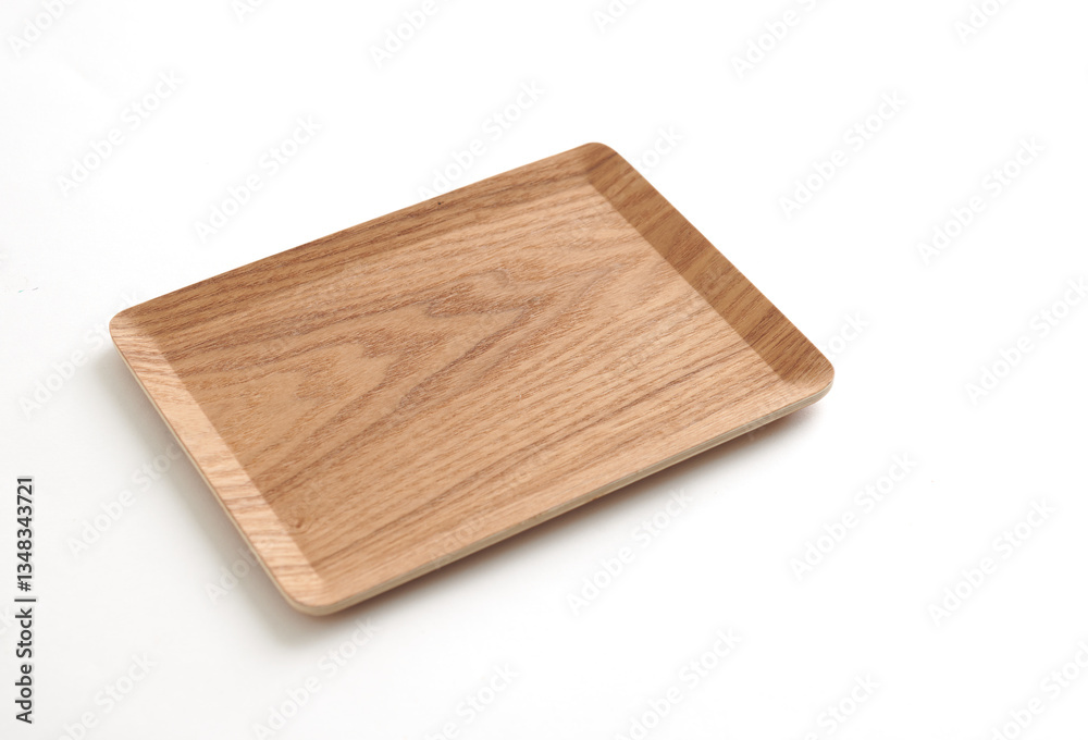 Rectangular wooden tray with natural grain texture, isolated on white background. Rectangular wooden tray with natural grain texture, isolated on white background.