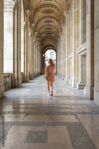 woman enjoying the beauty of the old architectural building