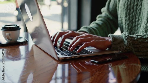 The Laptop in Cozy Café