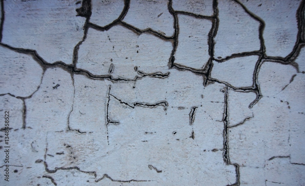 Fototapeta premium Cracked and broken gray wall, looks unique and suitable for background