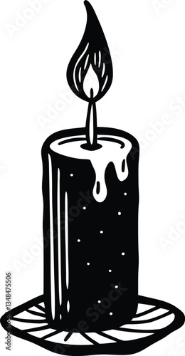 A black candle with a candle in the middle of it
