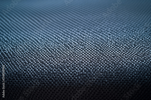 A modern neoprene fabric texture background in sleek charcoal gray. The thick, smooth material with slight elasticity provides a futuristic, technical feel, perfect for wetsuits, avant-garde fashion,