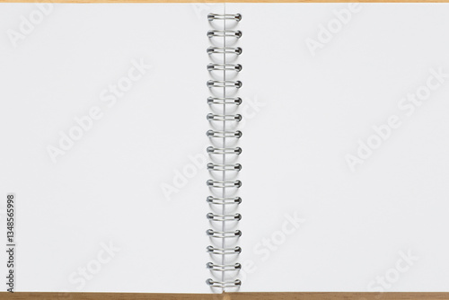 close up of blank pages of  notepad with metal binder