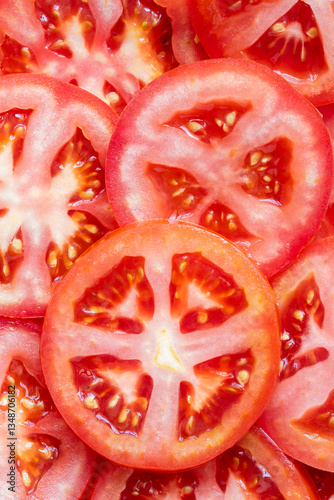 Pile of sliced fresh tomatoes. Top view
