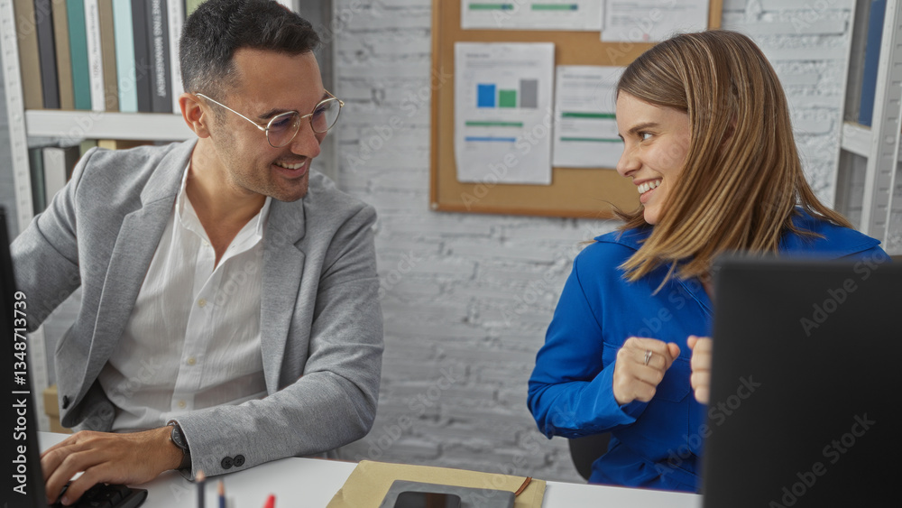 Fototapeta premium Man and woman smiling in modern office setting as partners engage in creative business planning, highlighting teamwork and professional collaboration in workplace environment.