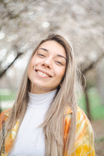 Young woman smiling in spring outdoor