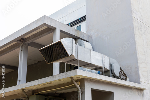 Steel air ducts on the roof exterior of the building, outdoor ventilation system from air ventilation pipes.