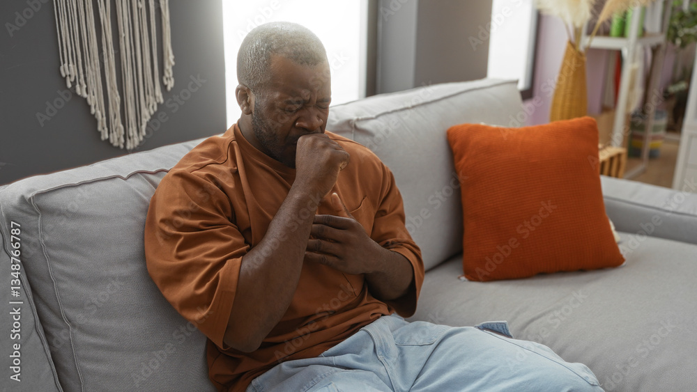 Man coughing while sitting on a comfortable couch at home in the living room, highlighting a quiet moment of illness and concern in a domestic setting. Man coughing while sitting on a comfortable couch at home in the living room, highlighting a quiet moment of illness and concern in a domestic setting.
