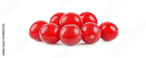 Red cranberries grouped together on a clean white background representing healthy antioxidant fruit in high-resolution closeup