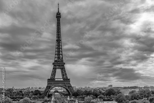 Panoramic view of the Eiffel Tower area of ​​Paris, France, under a dramatic sky, in black and white