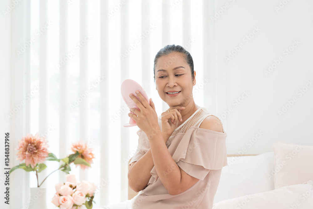 Asian woman, fashion and apply beauty. Asian adult woman applying makeup during looking in the mirror. Woman applying cheek or cheekbones Asian woman, fashion and apply beauty. Asian adult woman applying makeup during looking in the mirror. Woman applying cheek or cheekbones