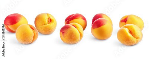 Fresh apricots grouped in pairs with natural red and orange color gradient on isolated clean white background seasonal summer fruit
